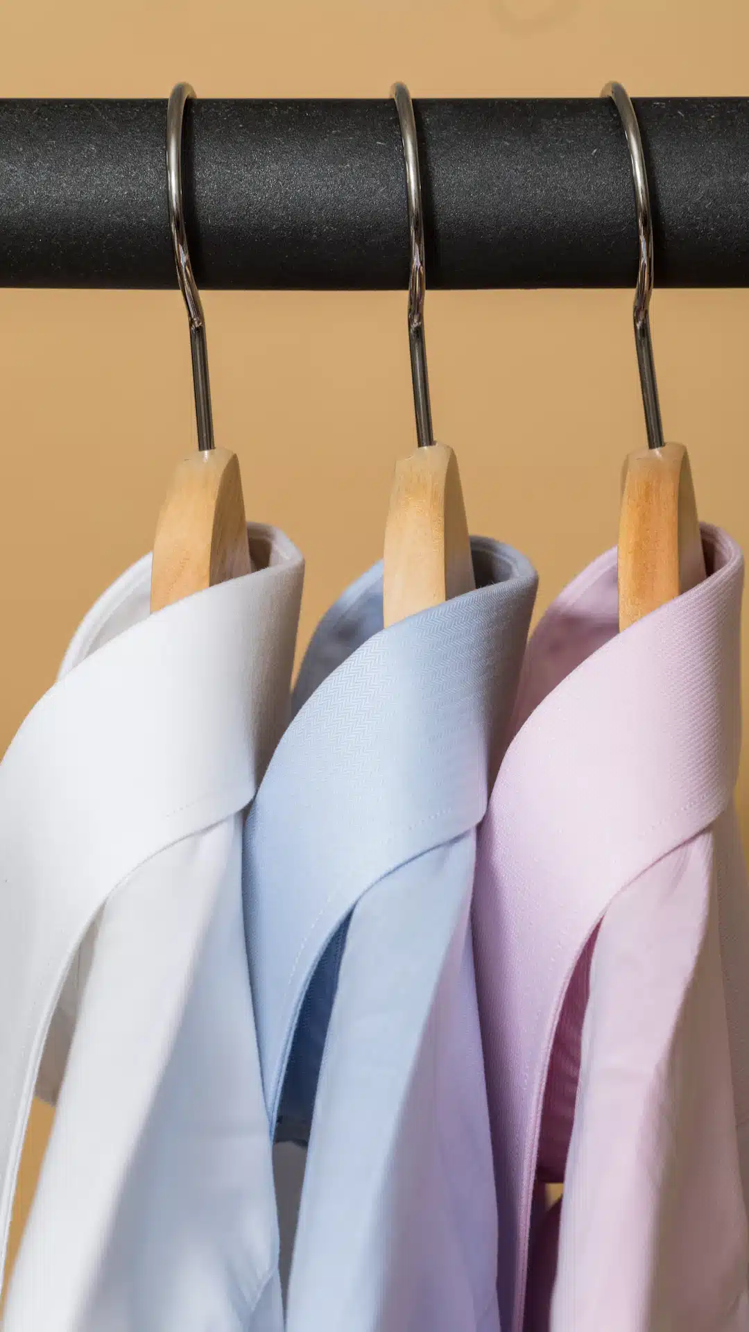 white and purple clothes hangers